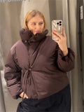 Prošívaná bunda Suzy s vysokým límcem a zavazováním