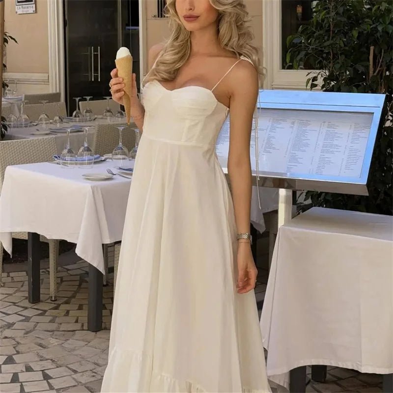 Jasmine. Volné stupňovité midi šaty